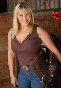 Chandra DeAlessandro stunt performer with blonde hair and blue eyes.